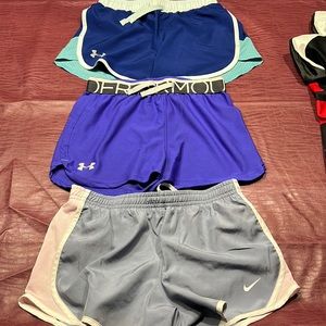 Three pair of girls athletic shorts, Nike and Under Armour